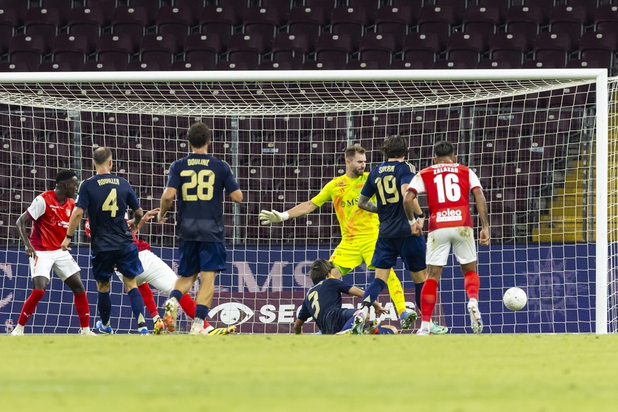 Braga&#039;s forward Amine El Ouazzani #9 scores the 0:1 Against Servette&#039;s goalkeeper Jeremy Frick, during the UEFA Europa League 3rd qualifying round second leg soccer match between Switzerland ...
