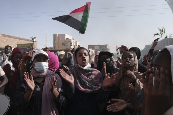 Sudanese protest against the military coup that ousted government last month, in Khartoum, Sudan, Wednesday, Nov. 17, 2021. Prime Minister Abdalla Hamdok is currently under house arrest in the capital ...