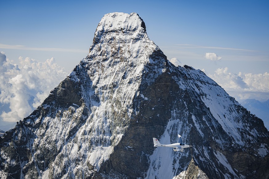 SolarStratos, a solar powered aircraft prototype, flown by Swiss adventurer Raphael Domjan flies pas the iconic Matterhorn mountain during a scouting and test flight near the alpine village of Zermatt ...