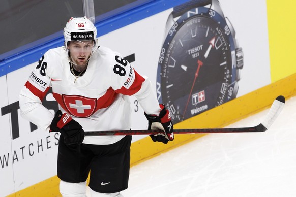 Switzerland's defender Janis Jerome Moser looks his teammate, during the IIHF 2023 World Championship preliminary round group B game between Canada and Switzerland, at the Riga Arena, in Riga, La ...