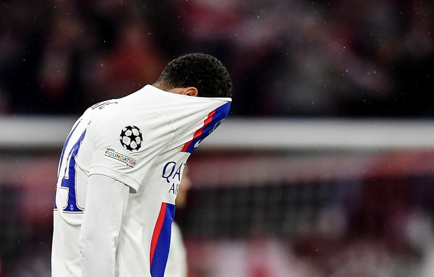 epa10510499 Hugo Ekitike of Paris Saint-Germain reacts after the UEFA Champions League Round of 16, 2nd leg match between Bayern Munich and Paris Saint-Germain in Munich, Germany, 08 March 2023. EPA/A ...