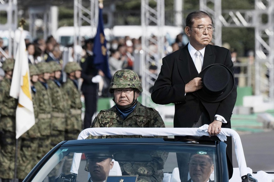 Japan?s Prime Minister Shigeru Ishiba, top right, attends an annual troop review at the Camp Asaka in the Tokyo suburbs Saturday, Nov. 9, 2024. (Koji Harada/Kyodo News via AP)
Shigeru Ishiba