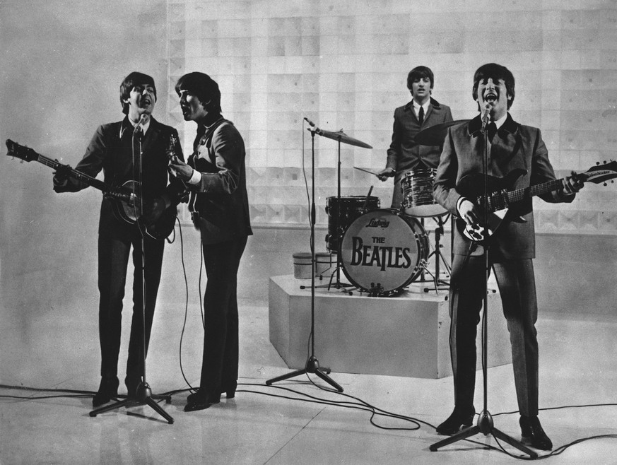 FILE - The Beatles are seen performing, date unknown. From left to right: Paul McCartney, George Harrison, Ringo Starr, and John Lennon. McCartney has revisited the breakup of The Beatles, refuting th ...