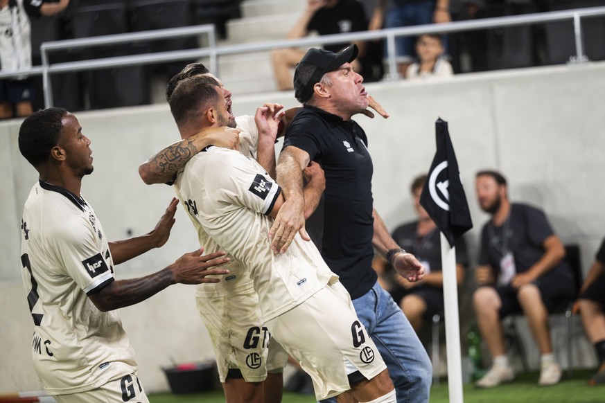 Albian Ajeti (LUG), left celebrate the game 1 - 0 goal with Beckham Castro (LUG), Renato Steffen (LUG) and Trainer Mattia Croci-Torti (LUG), during the Swiss Super League football league match between ...