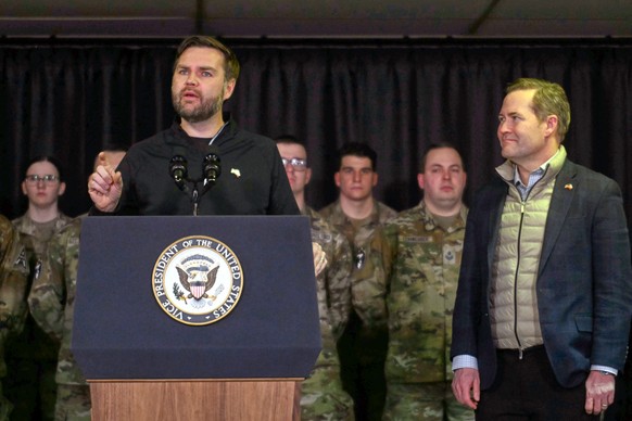 Vice President JD Vance speaks the U.S. military&#039;s Pituffik Space Base in Greenland, Friday, March 28, 2025, as White House national security adviser Mark Waltz listen. (Jim Watson/Pool via AP)
V ...