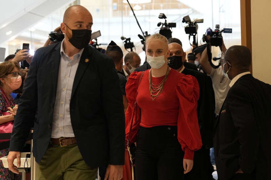 The teenager identifying herself online as Mila leaves at the courtroom Thursday, June 3, 2021 in Paris. Thirteen people went on trial Thursday in Paris accused of cyberbullying or death threats again ...