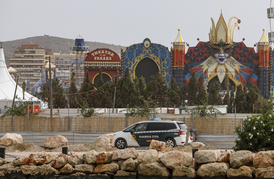 epaselect epa10118315 A Civil Guard vehicle is parked outside the venue of the Medusa Music Festival after a stage partially collapsed in the early morning hours due to strong winds, in the coastal ci ...