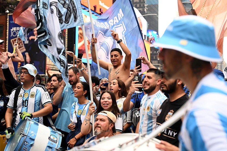 NEW YORK, NEW YORK - JULY 18: Fans of Argentina show support to their team ahead of the FIFA World Cup 2026 Final Match against Spain at Times Square on July 18, 2026 in New York City. (Photo by Hanna ...