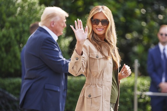 First lady Melania Trump waves as she and President Donald Trump depart the White House, Friday, July 11, 2025, in Washington. (AP Photo/Evan Vucci)
Donald Trump