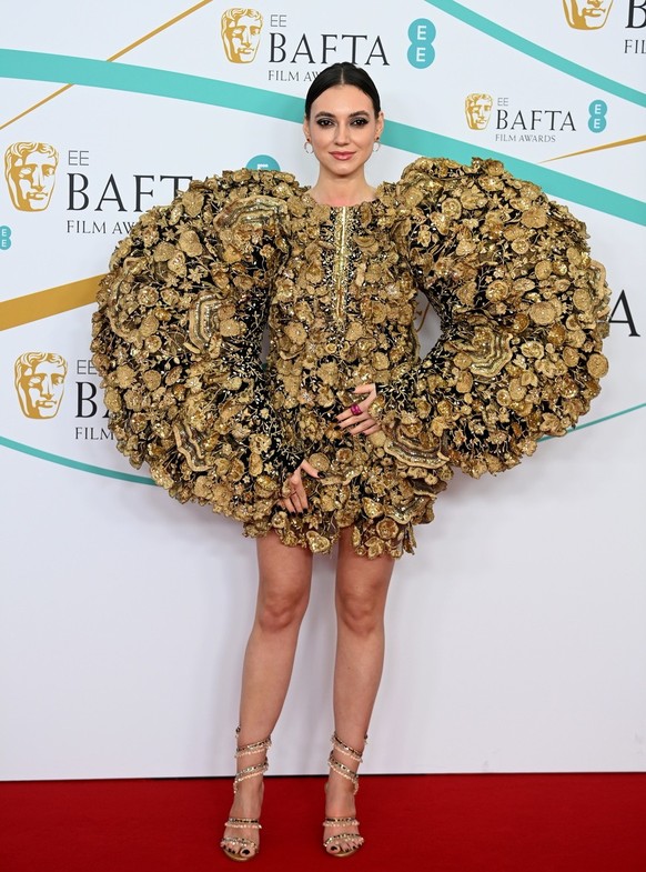 epa10477818 Andreea Cristea arrives for the 2023 EE BAFTA Film Awards ceremony at the Southbank Centre in London, Britain, 19 February 2023. The event is hosted by the British Academy of Film and Tele ...