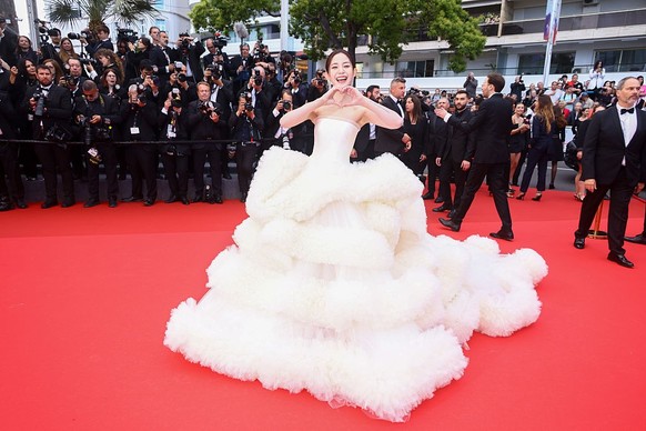 CANNES, FRANCE - MAY 13: Wan QianHui attends the red carpet for the opening ceremony and &quot;Partir Un Jour&quot; (Leave One Day) screening at the 78th annual Cannes Film Festival at Palais des Fest ...