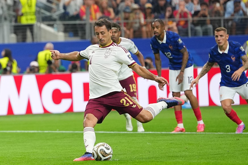 Spain's Mikel Oyarzabal scores from the penalty spot the opening goal during a World Cup semifinal soccer match between France and Spain in Arlington, Texas, near Dallas, Tuesday, July 14, 2026.  ...