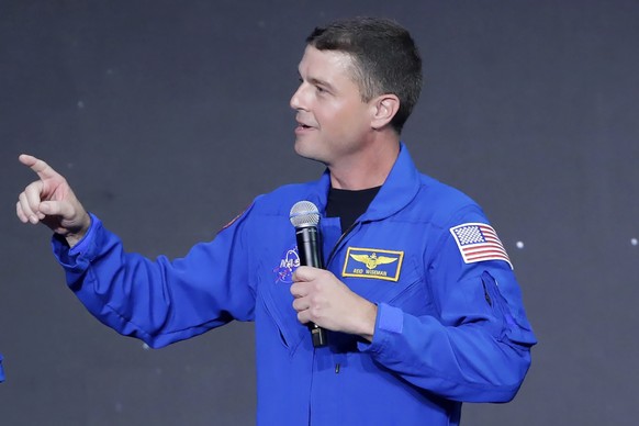 Reid Wiseman, mission commander, gives remarks during a NASA ceremony naming the four astronauts who will fly around the moon by the end of next year on the Artemis II mission, at a ceremony held in t ...