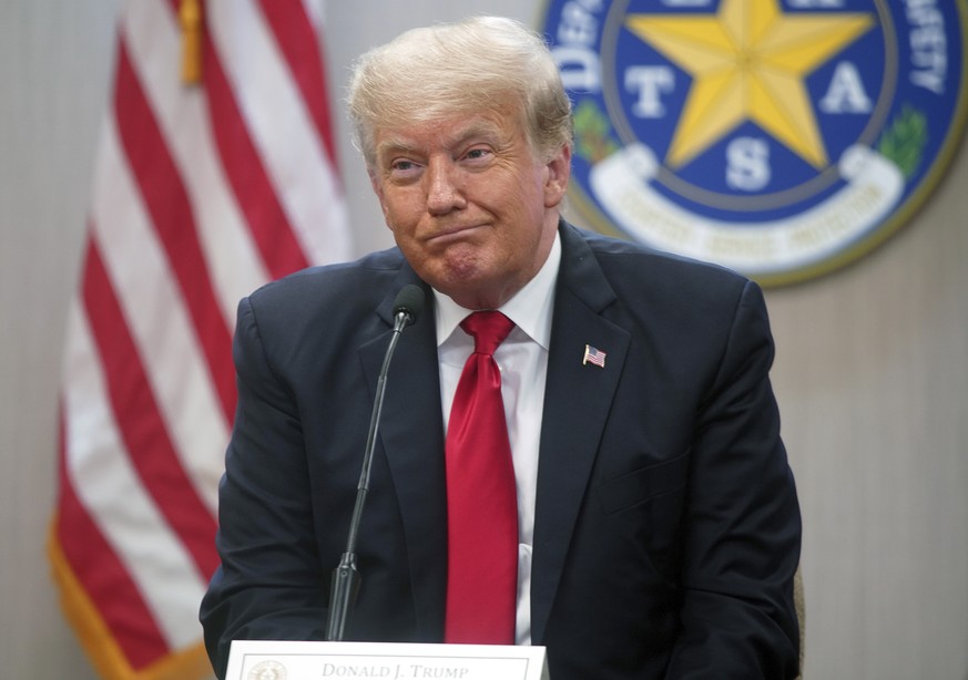 Former President Donald Trump reacts during a border security briefing with Texas Gov. Greg Abbott at the Texas DPS Weslaco Regional Office on Wednesday, June 30, 2021, in Weslaco, Texas. (Joel Martin ...