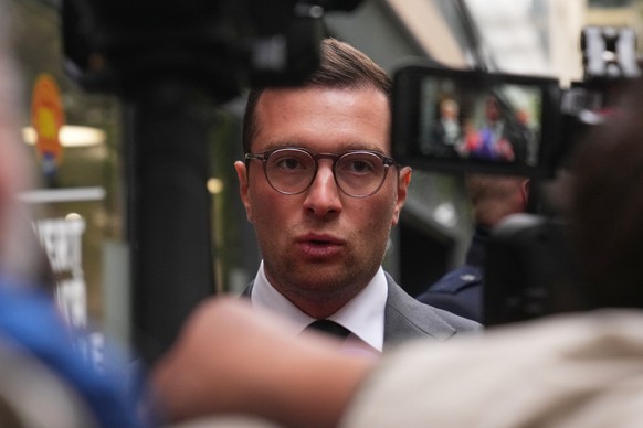French far right National Rally party president Jordan Bardella answers reporters following a meeting, after France&#039;s prime minister Sebastien Lecornu resigned plunging the country into a deep po ...