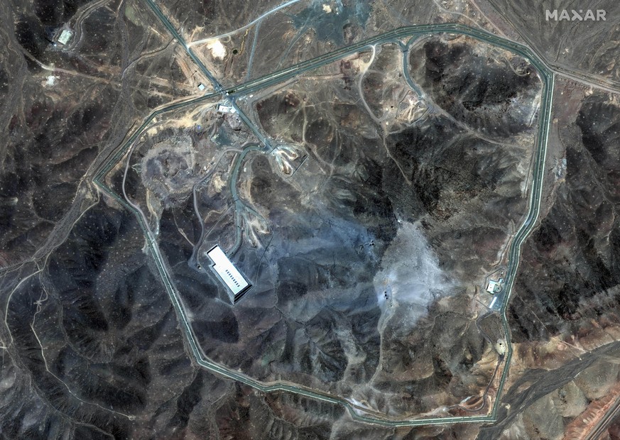 KEYPIX - This satellite image provided by Maxar Technologies shows damage at the Fordo enrichment facility in Iran after U.S. strikes, Sunday, June 22, 2025. (KEYSTONE/Maxar Technologies via AP)