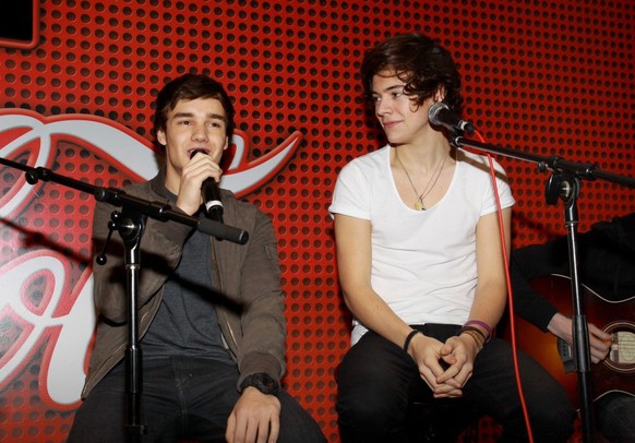 CHICAGO - FEBRUARY 24: Singers Liam Payne and Harry Styles of British-Irish boy band One Direction performs in the KISS-FM "Coca-Cola Lounge" in Chicago, Illinois on February 24, 2012. (Phot ...