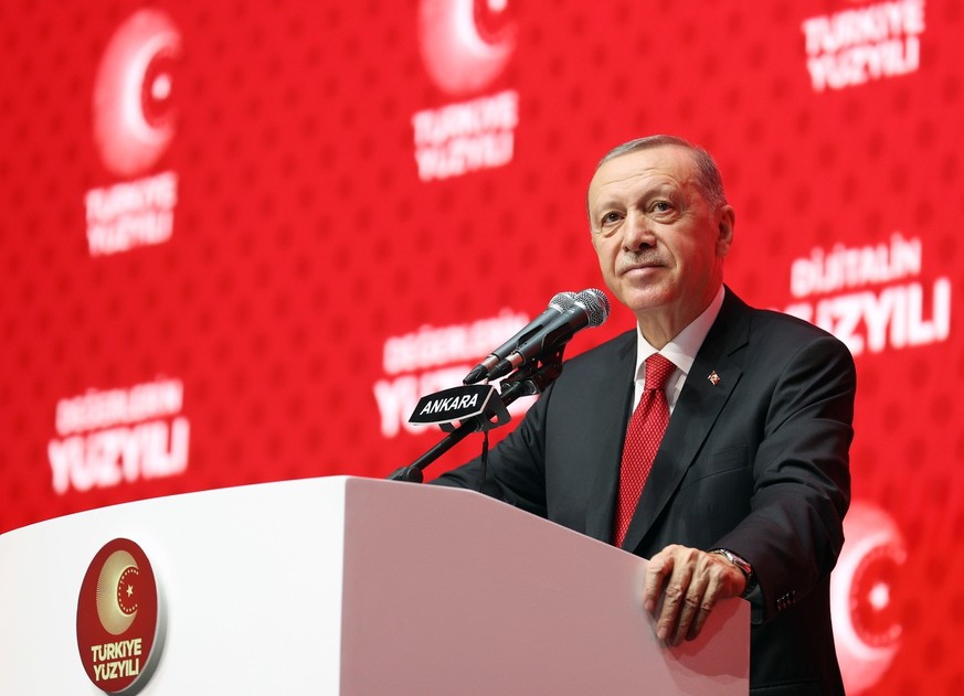 A handout photo made available by the Turkish President&#039;s press office shows Turkish President Recep Tayyip Erdogan speaking during the &#039;Century of Turkey&#039; meeting in Ankara, Turkey, 28 ...