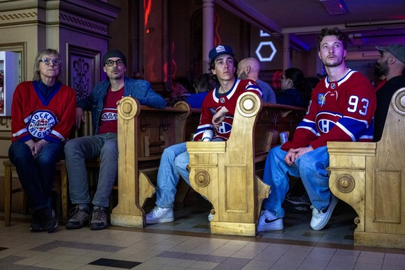 Montreal Canadiens fans watch the live broadcasting of the Stanley Cup playoff game against Tampa Bay Lightning at the Cathedrale Saint-Jean-lEvangeliste, in Saint-Jean-sur-Richelieu, Quebec, on Apri ...
