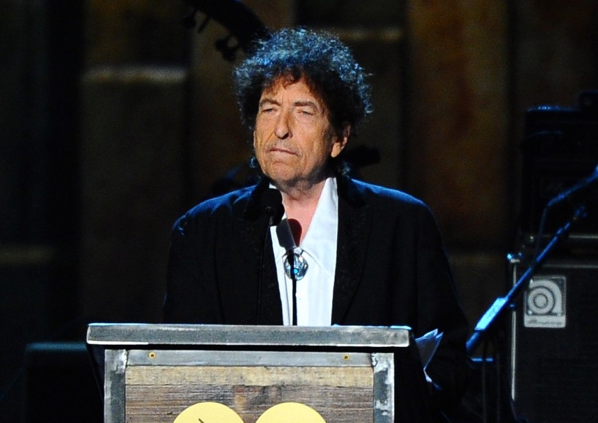 FILE - In this Feb. 6, 2015, file photo, Bob Dylan accepts the 2015 MusiCares Person of the Year award at the 2015 MusiCares Person of the Year show in Los Angeles. Dylan, who has a reputation as a re ...