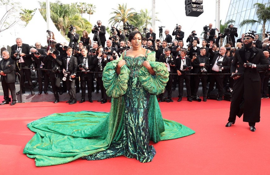 epa10631584 Chika Ike (L) arrives for the Opening Ceremony of the 76th annual Cannes Film Festival, in Cannes, France, 16 May 2023. The festival runs from 16 to 27 May. EPA/Mohammed Badra