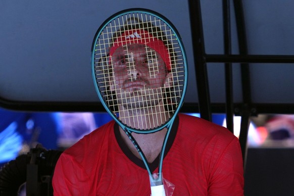 Stefanos Tsitsipas of Greece reacts during a break in his first round match against Alex Michelsen of the U.S. at the Australian Open tennis championship in Melbourne, Australia, Monday, Jan. 13, 2025 ...