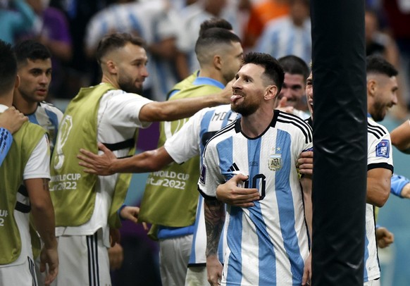 epa10358221 Lionel Messi of Argentina reacts after scoring the 2-0 during the FIFA World Cup 2022 quarter final soccer match between the Netherlands and Argentina at Lusail Stadium in Lusail, Qatar, 0 ...