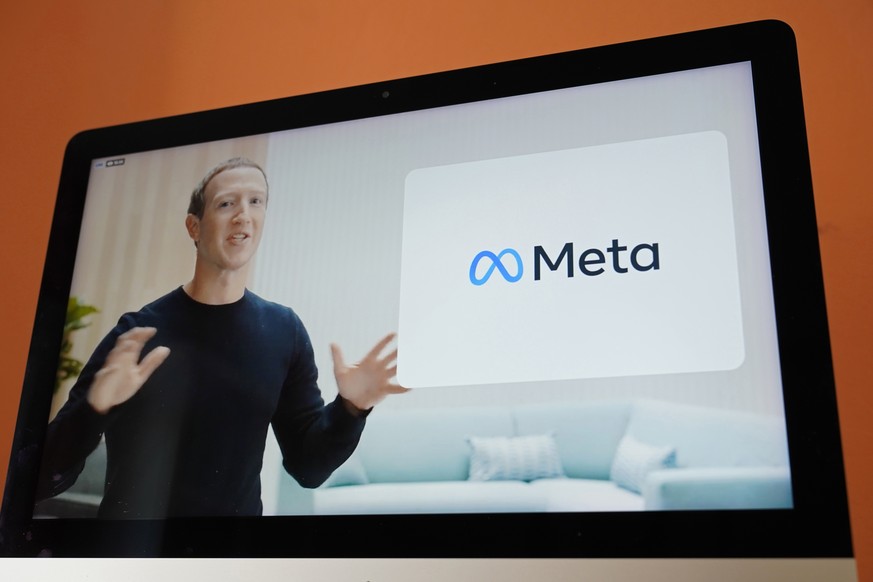 FILE - Seen on the screen of a device in Sausalito, Calif., Facebook CEO Mark Zuckerberg announces the company&#039;s new name, Meta, during a virtual event on Thursday, Oct. 28, 2021. Zuckerberg prom ...