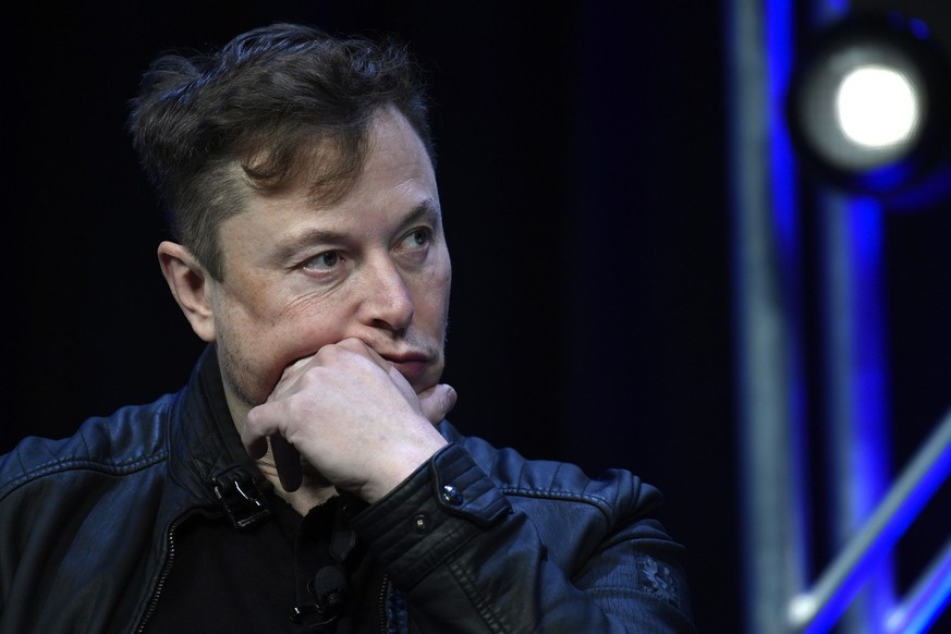 Tesla and SpaceX Chief Executive Officer Elon Musk listens to a question as he speaks at the SATELLITE Conference and Exhibition in Washington, Monday, March 9, 2020. (AP Photo/Susan Walsh)