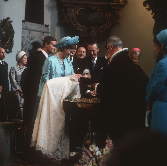 Princess Margrethe of Denmark and Prince Henrik at the christening of their son Prince Frederik in Copenhagen on June 24, 1968. (Photo by Keystone/Getty Images)