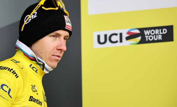 epa12261977 Yellow Jersey overall leader Slovenian rider Tadej Pogacar of UAE Team Emirates enters the podium after the 19th stage of the Tour de France cycling race over 93.1 km from Albertville to L ...