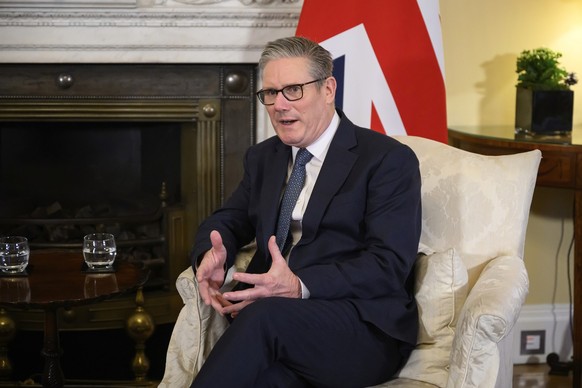 Britain&#039;s Prime Minister Keir Starmer speaks with the Sultan of Brunei, not pictured, during a meeting in 10 Downing Street, London, Thursday Dec. 19, 2024 (Leon Neal/Pool Photo via AP)