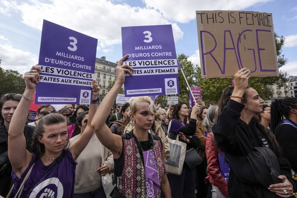 People take part in a gathering in support of 71-year-old Gisele Pelicot who was allegedly drugged by her ex-husband and raped by dozens of men while unconscious, Saturday, Sept. 14, 2024 in Paris. Pl ...