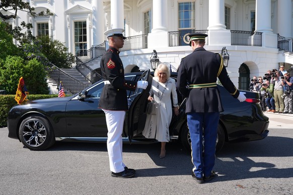 Britain's Queen Camilla arrives with Britain's King Charles III to be greeted by President Donald Trump and first lady Melania Trump at the White House, Monday, April 27, 2026, in Washington ...