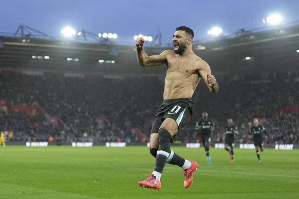 Liverpool&#039;s Mohamed Salah celebrates after scoring during the English Premier League soccer match between Southampton and Liverpool in Southampton, England, Sunday, Nov. 24, 2024. (AP Photo/Sean  ...