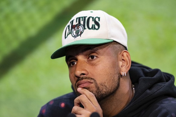 FILE - Australia&#039;s Nick Kyrgios listens during a pre-tournament press conference at the All England Lawn Tennis and Croquet Club in Wimbledon, south west London, Sunday July 2, 2023. Kyrgios, the ...