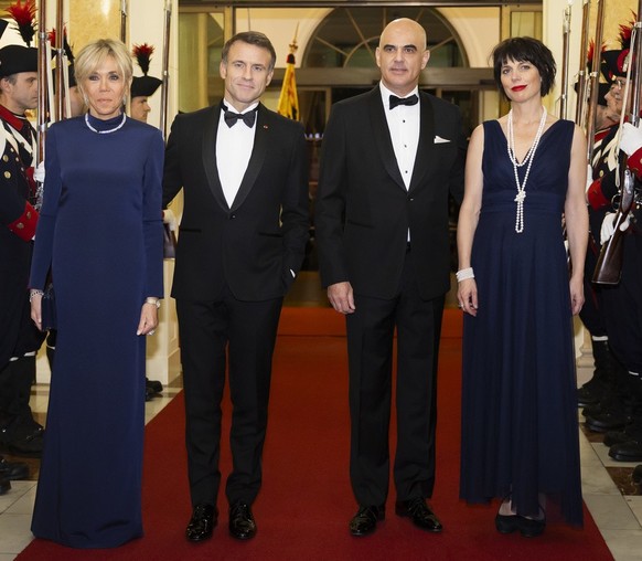 Brigitte Macron, French President Emanuel Macron, Swiss Federal President Alain Berset and Muriel Zeender Berset, from left, pose at the state dinner hosted in honor of French President and his wife b ...