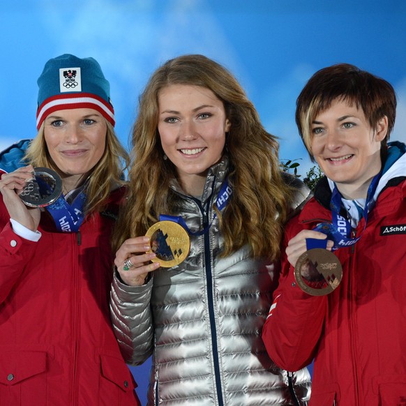 Olympics: Medal Ceremony-Day Fifteen Feb 22, 2014 Sochi, RUSSIA Marlies Schild AUT left, Mikaela Shiffrin USA center, and Kathrin Zettel AUT right celebrate winning the silver, gold, and bronze medals ...