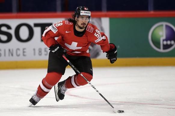Switzerland&amp;#039;s Eric Blum controls the puck, during the IIHF Ice Hockey World Championships preliminary round match Switzerland vs Canada at the Globe Arena in Stockholm, Sweden, on Sunday, 5 M ...