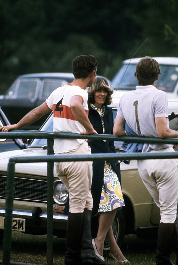 Prince Charles chats to Camilla Parker-Bowles at a polo match, circa 1972. (Photo by © Hulton-Deutsch Collection/CORBIS/Corbis via Getty Images)