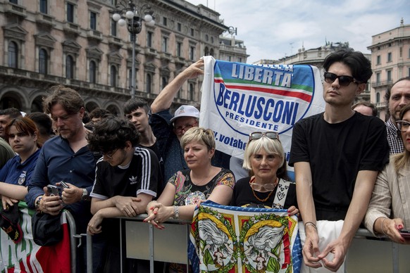 People gather in front of Milan&#039;s Gothic Cathedral, ahead of former Italian premier Silvio Berlusconi?s state funeral, Italy, Wednesday, June 14, 2023. Berlusconi died at the age of 86 on Monday  ...