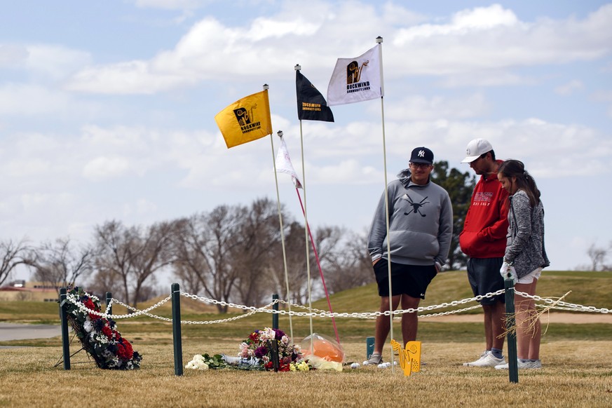 University of the Southwest golf players, from left, Phillip Lopez, Jonny Flores and Halie Cruz visit the site of a memorial, Thursday, March 17, 2022 at the Rockwind Community Links in Hobbs, N.M., e ...