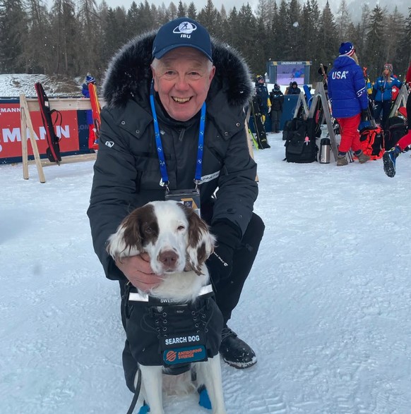 Molly avec Olle Dahlin, le président de l'Union internationale de biathlon (IBU).