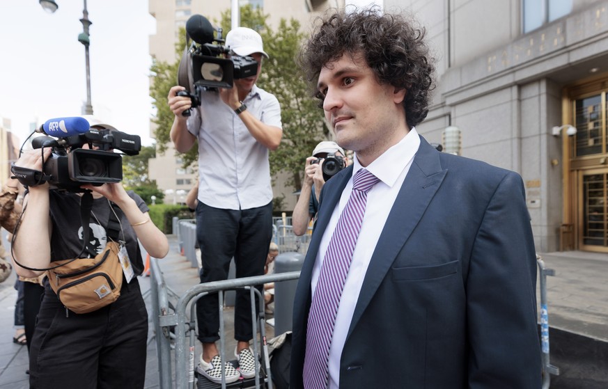 epa10770325 FTX founder Sam Bankman-Fried departs a United States federal courthouse following a bail hearing in New York, New York, USA, 26 July 2023. Bankman-Fried is facing federal charges over the ...