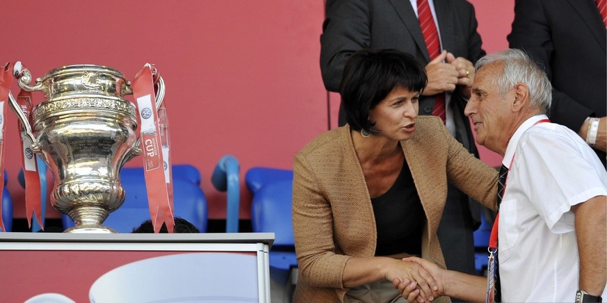 Federal Councilor Doris Leuthard, left, consoles Neuchatel&#039;s coach Bernard Challandes, right, after the Swiss Cup final soccer match between Neuchatel Xamax and FC Sion at the St. Jakob-Park stad ...