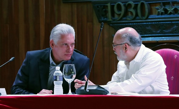 epa10071237 Cuba's President Miguel Diaz-Canel (L) and Undersecretary of Industry and Commerce of Mexico Hector Guerrero attend the inauguration of the Cuba-Mexico Business Forum at the Hotel Nacional ...