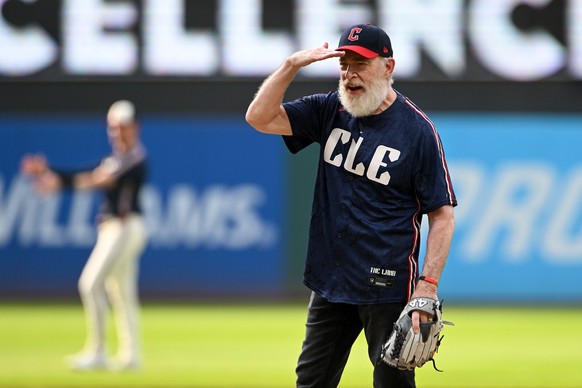 CLEVELAND, OHIO - JUNE 27: Actor J.K. Simmons prepares to throw the ceremonial first pitch prior to a game between the St. Louis Cardinals and the Cleveland Guardians at Progressive Field on June 27,  ...