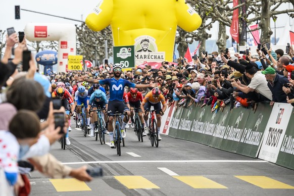 Fernando Gaviria Rendon from Colombia of team Movistar celebrates as he crosses the finish line of the fifth and last stage, a 170,8 km race between Vufflens-la-Ville and Geneva at the 76th Tour de Ro ...