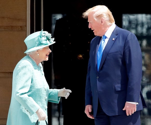 LONDON, UNITED KINGDOM - JUNE 03: (EMBARGOED FOR PUBLICATION IN UK NEWSPAPERS UNTIL 24 HOURS AFTER CREATE DATE AND TIME) Queen Elizabeth II and U.S. President Donald Trump attend the Ceremonial Welcom ...