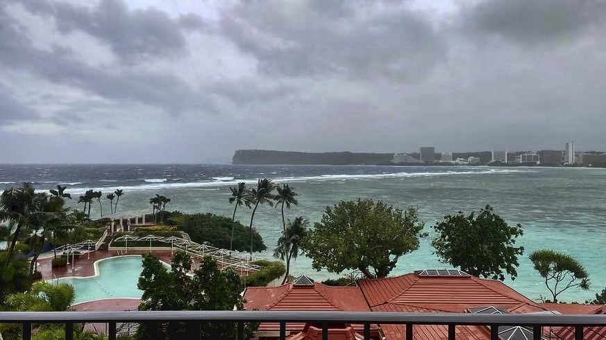 This photo provided by the U.S. Coast Guard overlooking Noverlooking Tumon Bay in Guam, as Super Typhoon Mawar closes in on Tuesday, May 23, 2023. Residents of Guam are stockpiling supplies, battening ...